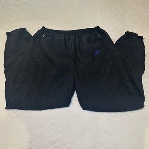 Vintage 1990s Black Tag Nike Challenge Court Track Pants. Black. Size: Large.